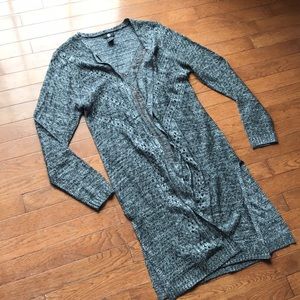 Duster in grey fleck with cut outs